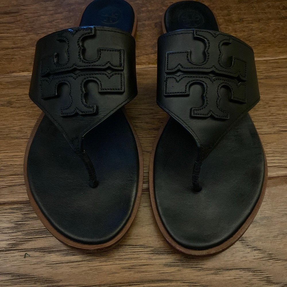 Tory Burch Weston full logo sandals in black.